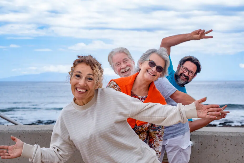 Playful group of family having fun together in outdoor excursion
