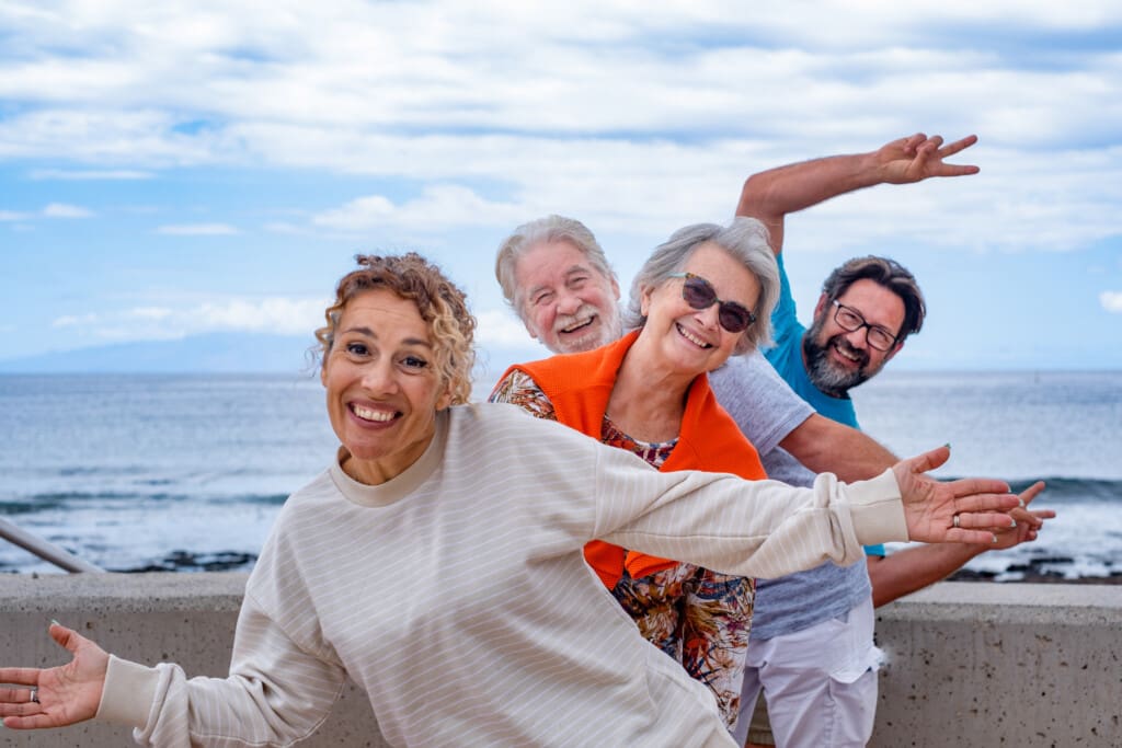 Playful group of family having fun together in outdoor excursion
